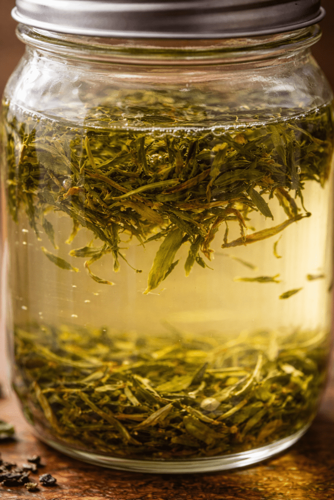 tea leaves slowly steeping in cold water showing gentle extraction process