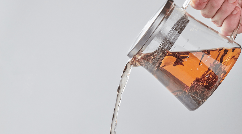 tea leaves expanding in hot water during steeping