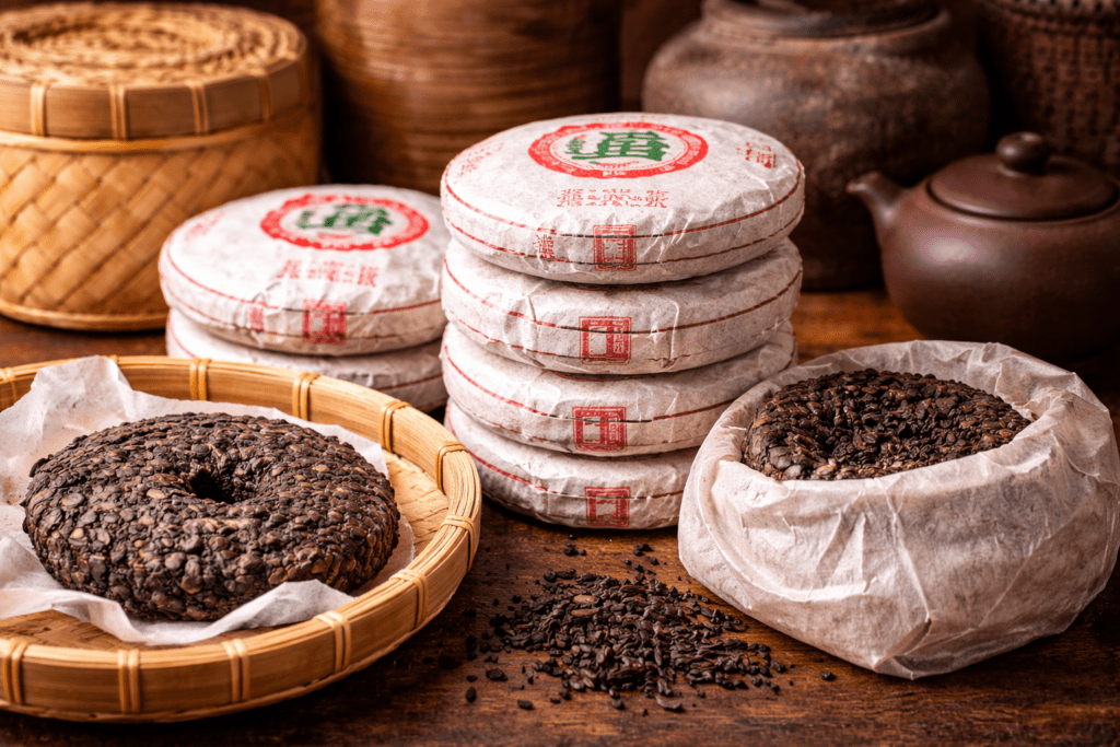 pu erh tea cakes stored in traditional aging environment