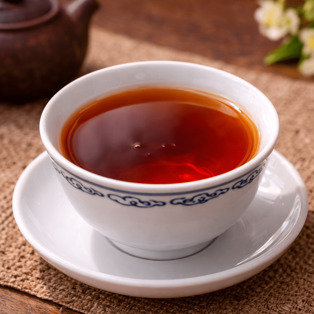 chinese black tea served in porcelain cup